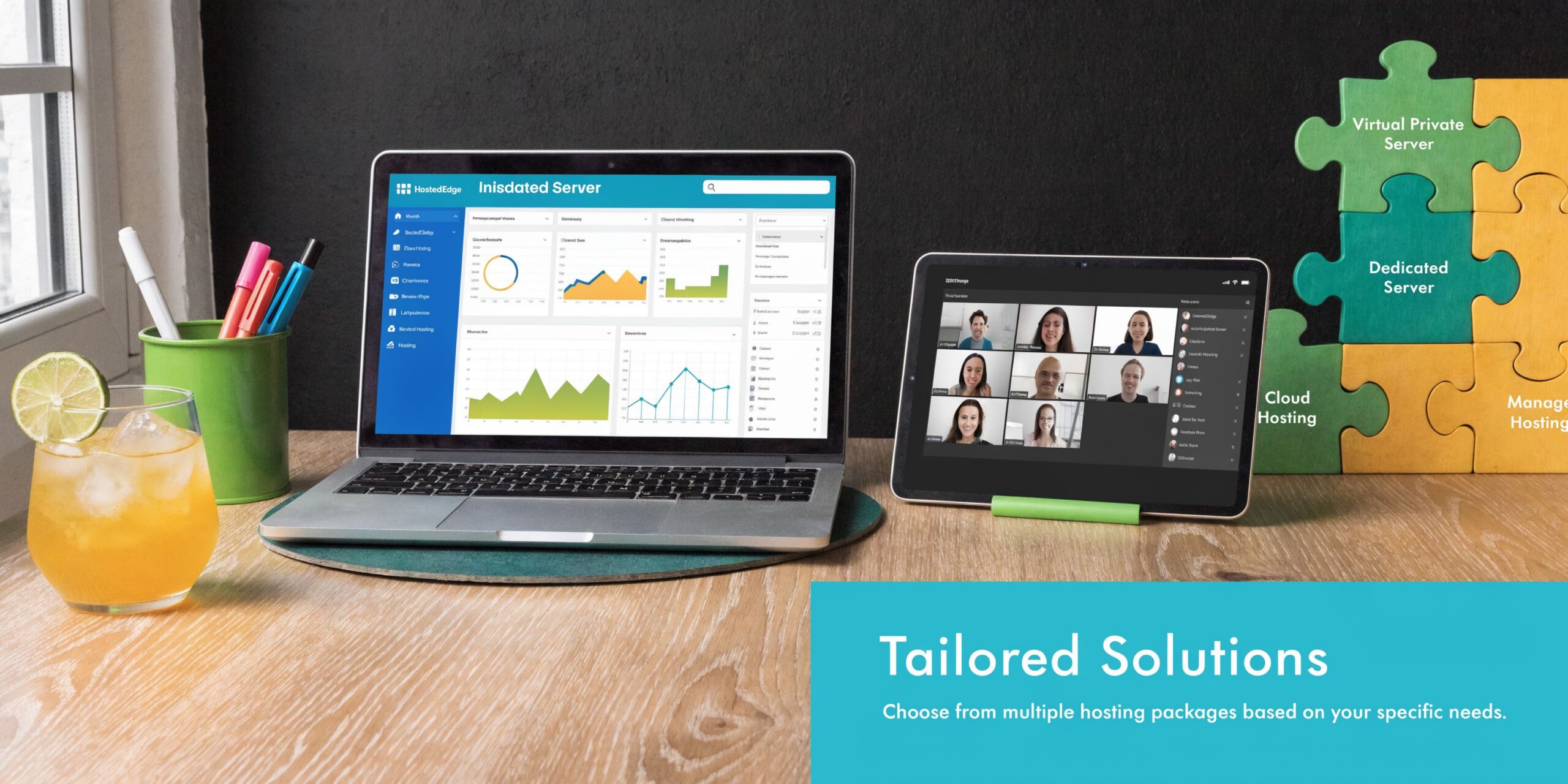 A laptop and tablet showing web hosting dashboards on a desk with a glass of lemonade.